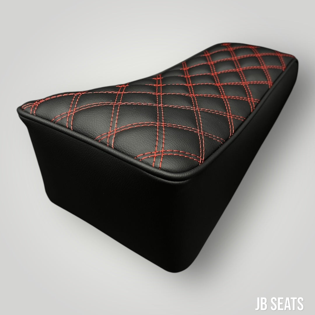 Ergonomic mini bike seat with durable black vegan leather and diamond stitching