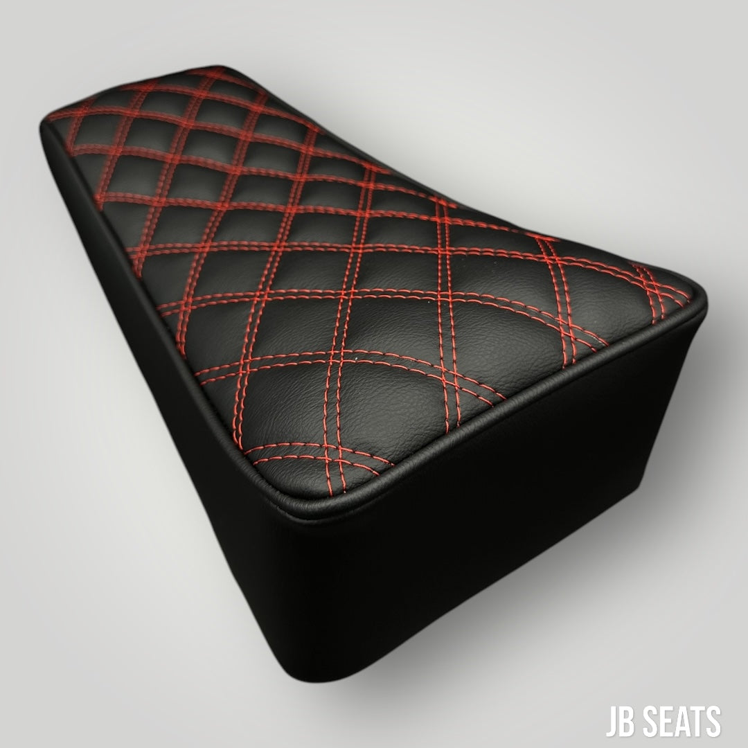 Ergonomic mini bike seat with durable black vegan leather and diamond stitching